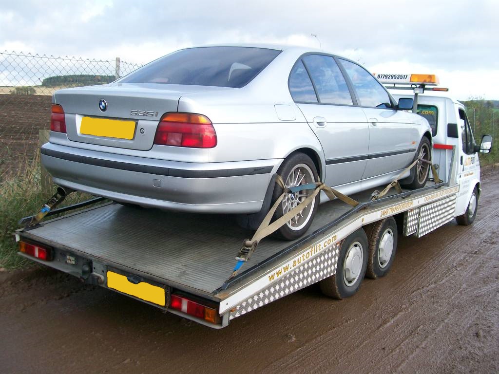 BMW 535i on the back of the Autoflit Transporter