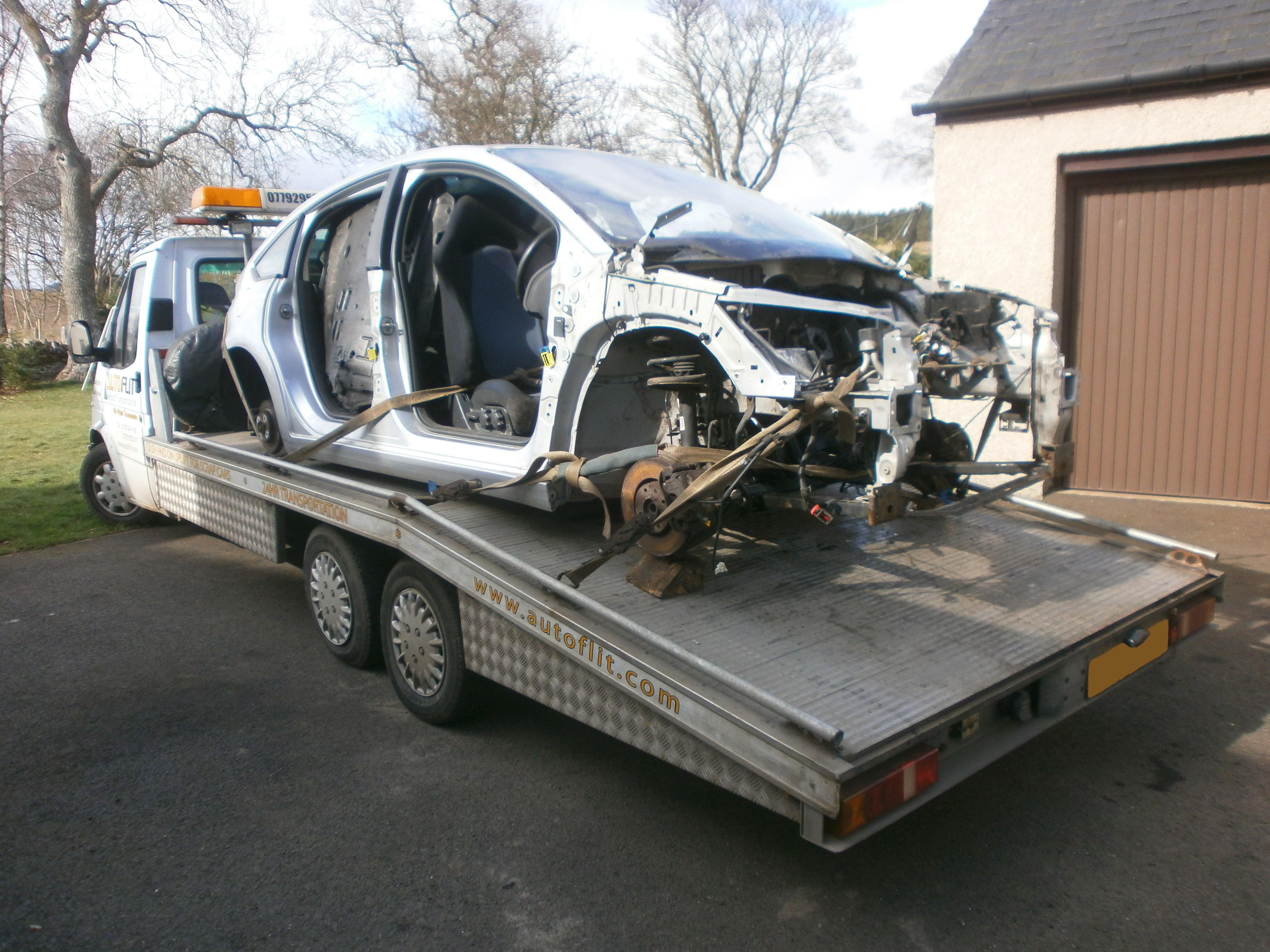Scrap Citroen C4 on the Autoflit transporter