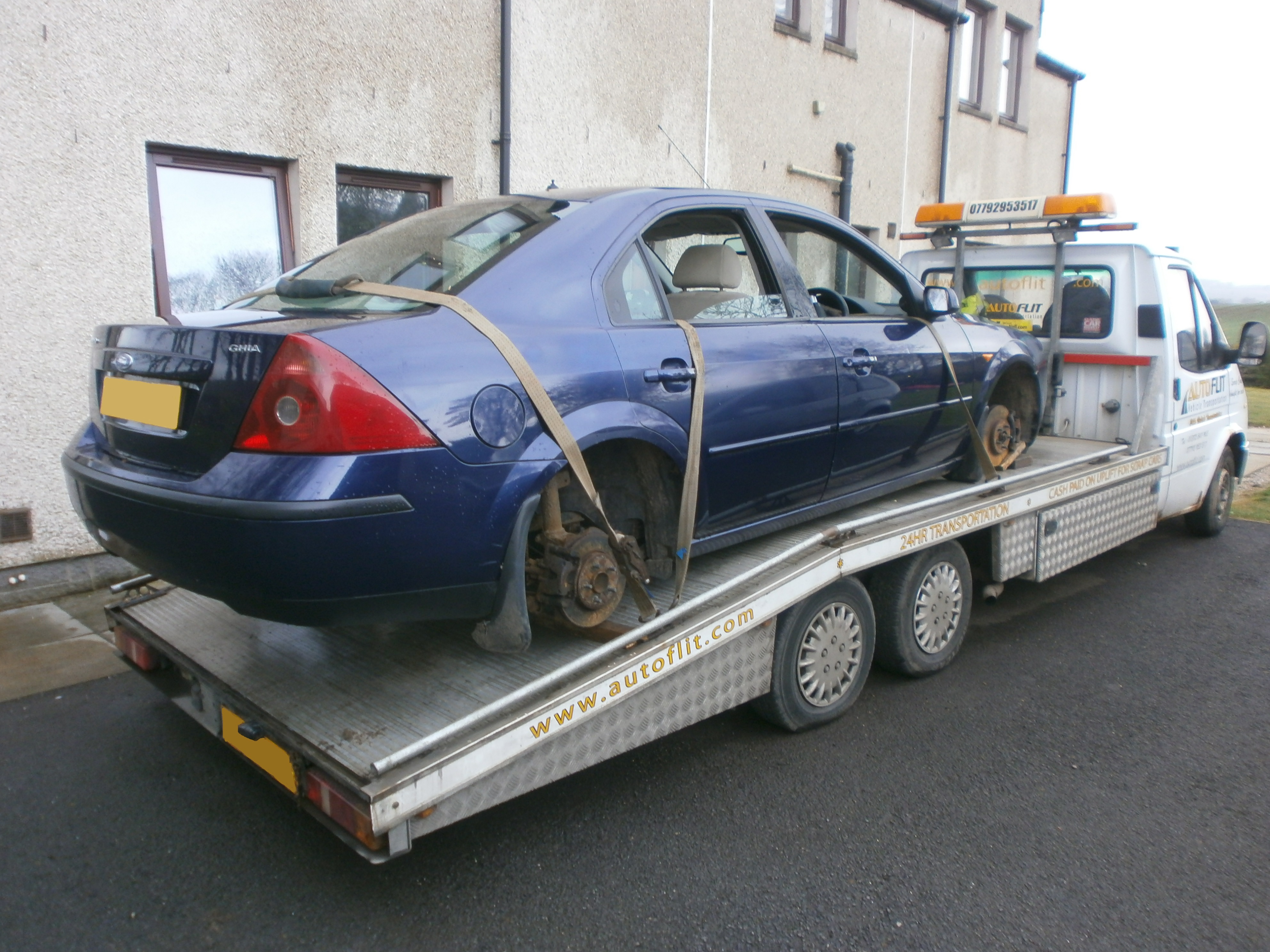 Ford Mondeo on the back of the Autoflit transporter