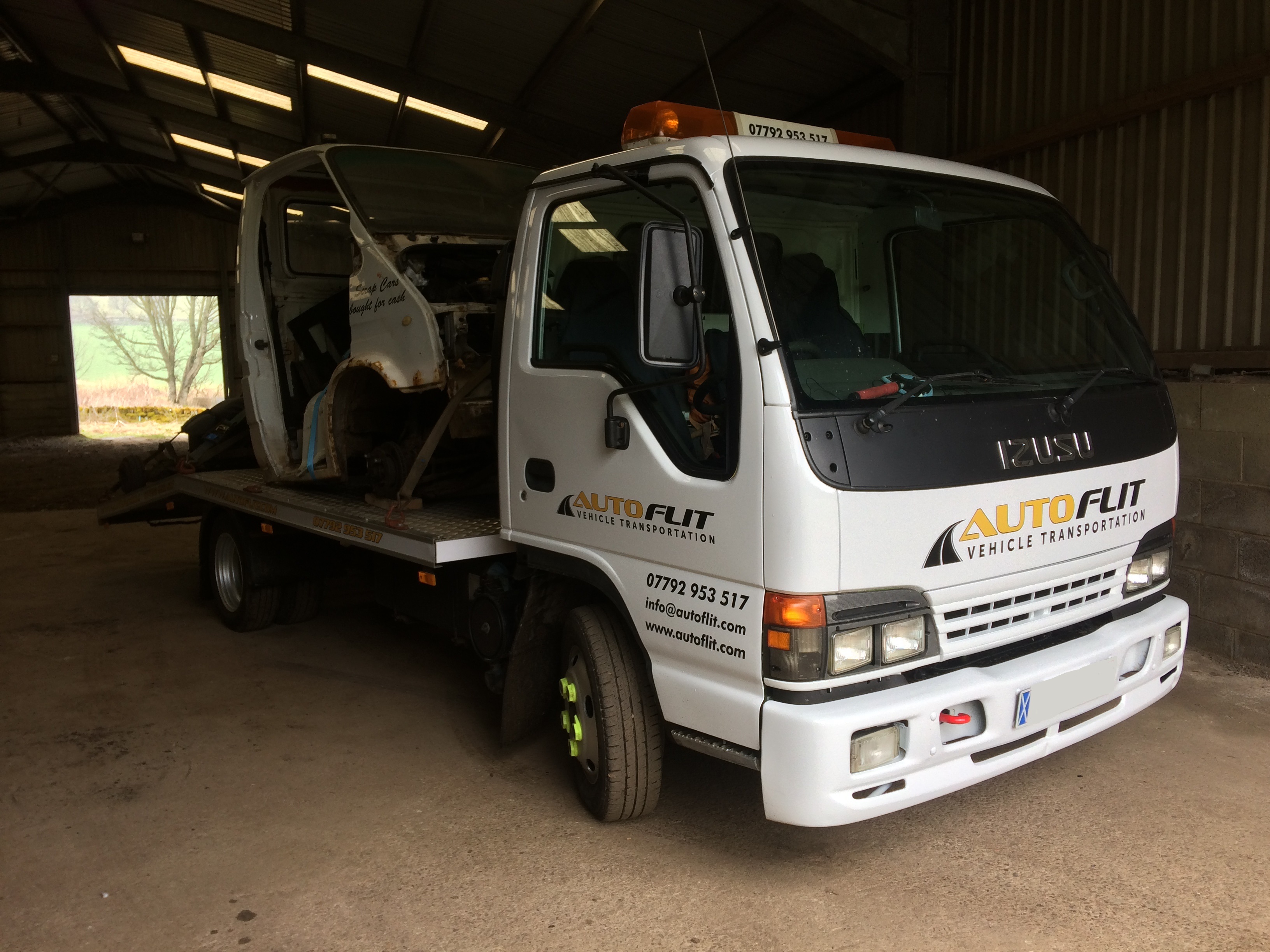 Shell of the old Autoflit transporter on the back of the new Autoflit transporter